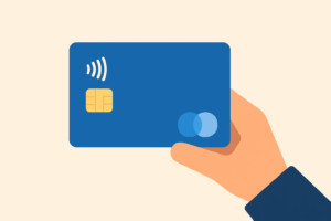 Stilisiert dargestellte Hand hält eine Bezahlkarte.